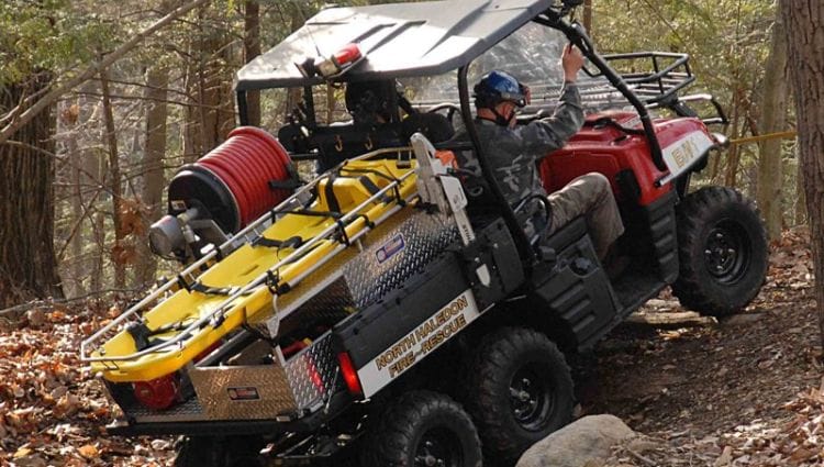 A Person Inside Of An Atv That&Amp;Apos;S Going Up A Hill.