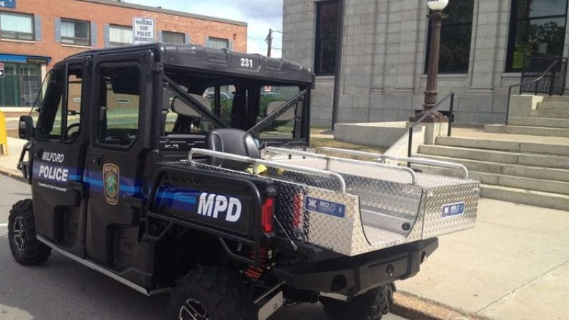 A police UTV in a quiet community.