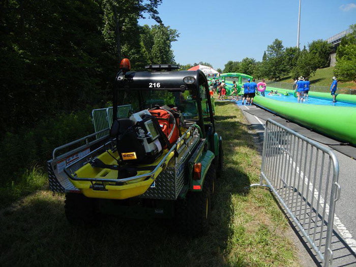 Medlite Skid Unit At An Event With Water Activity. - Kimtek Corporation Medlite Skid Unit At An Event With Water Activity.