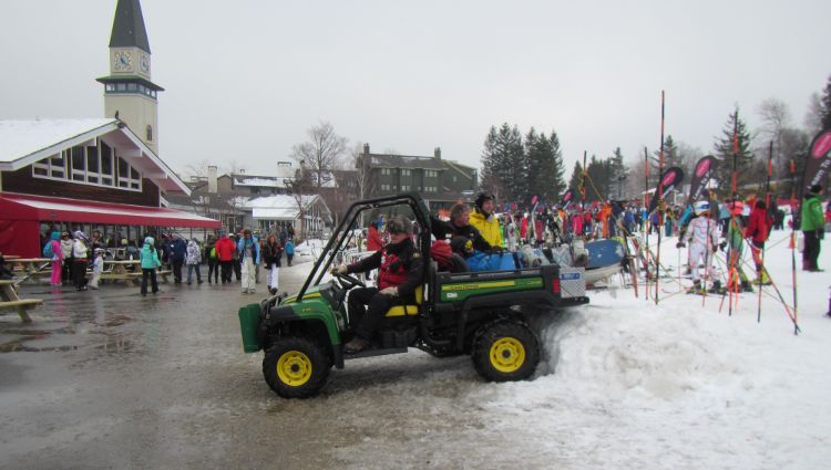 A UTV equipped to respond to a medical emergency is at a busy ski resort.